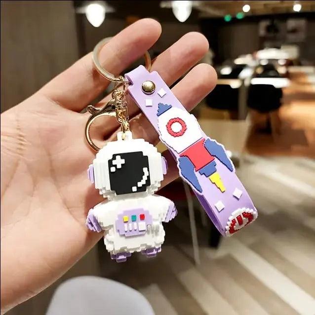BUILDING BLOCK ASTRONAUT KEYCHAIN SPARKLES