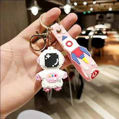 BUILDING BLOCK ASTRONAUT KEYCHAIN SPARKLES